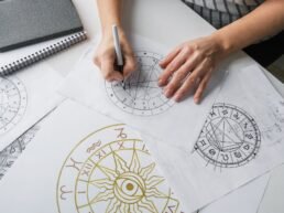 Astrology. Astrologer calculates natal chart and makes a forecast of fate Tarot cards